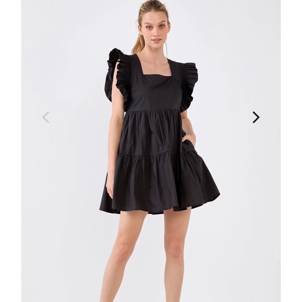 English Factory, new with tags, never worn, size small, ruffled sleeve dress.